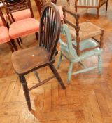 An old single comb back Windsor chair with another 19th century kitchen chair and a child's chair