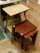 A a nest of two mahogany tables and a Victorian bamboo two-tier occasional table,