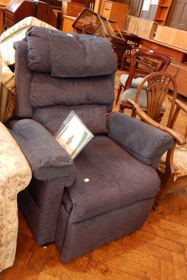The Lisa Recliner adjustable armchair in blue upholstery