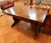 A mahogany extending dining table,
