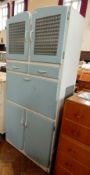 A 20th century kitchen cupboard with cupboard to top, two short cutlery drawers,