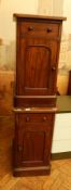 A pair of Victorian mahogany pedestals each fitted with single drawer over a cupboard door,