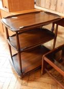 A stained oak three-tier tea trolley