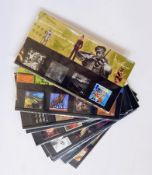 A quantity of stamps on piece and 13 GB presentation packs (1 box)