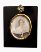 19th century school Miniature on ivory Head and shoulders portrait of a lady in black dress and