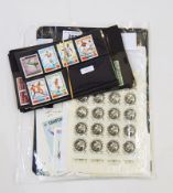 Two thematic stamp folders and a packet containing a quantity of mini-sheets,