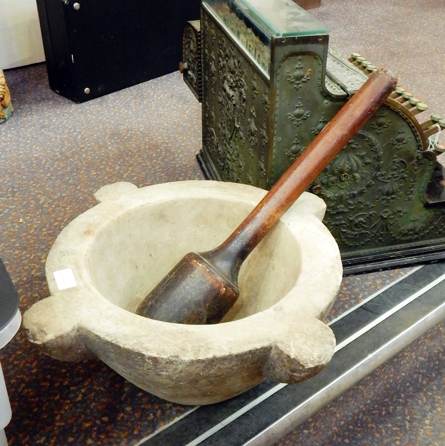 A large marble pestle and wooden mortar (from 20 The Vale, Chelsea,