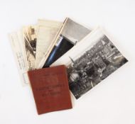 A collection of military photographs, a soldiers service and pay book,