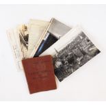 A collection of military photographs, a soldiers service and pay book,