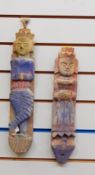 Two hanging carved wooden painted tribal figures