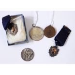 A quantity coins and medals