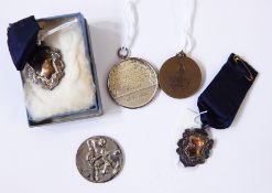 A quantity coins and medals