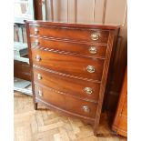 A mahogany chest of five graduated drawers, on square legs,