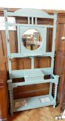 A 20th century painted hallstand with umbrella stand, six hooks and mirror,