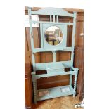 A 20th century painted hallstand with umbrella stand, six hooks and mirror,