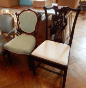 A 19th century dining chair with carved splat,