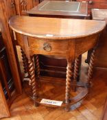 A gateleg table on spirally turned supports, united by U-stretcher,