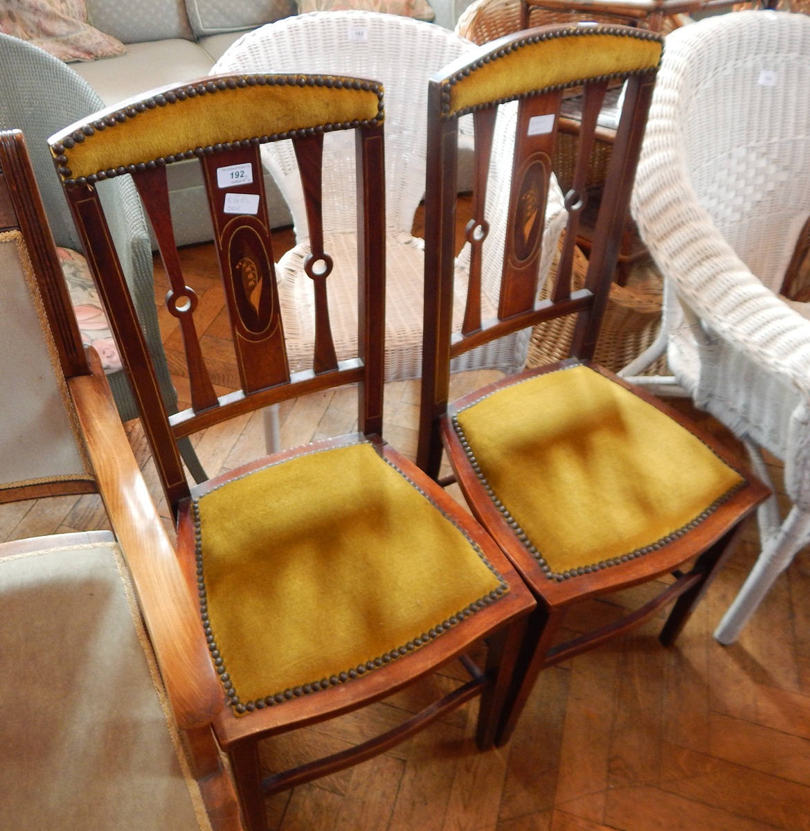 Pair Edwardian inlaid bedroom chairs, each with arched back Lily of the Valley inlaid splat,