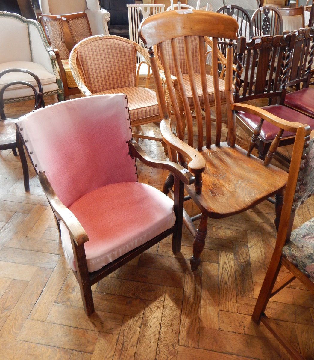 A kitchen chair with lathe back,