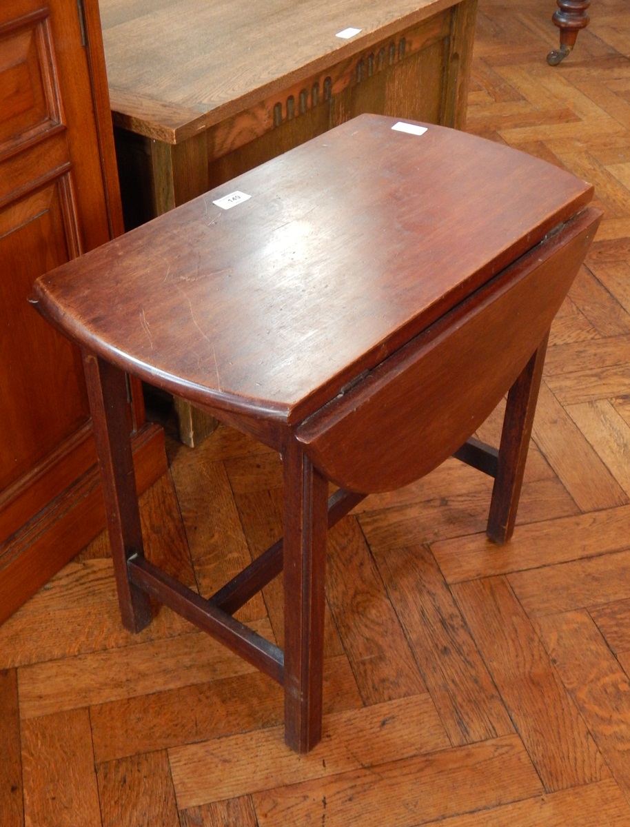 A drop leaf occasional table,