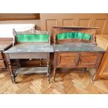 Two marble-topped washstands with tile backs glazed green,