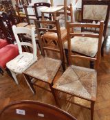 A pair of kitchen chairs with rush seats,