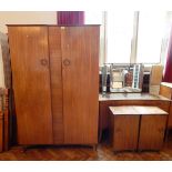 A bedroom suite of Wrighton Distinctive Furniture 1882 viz:- double wardrobe, two bedside cabinets,