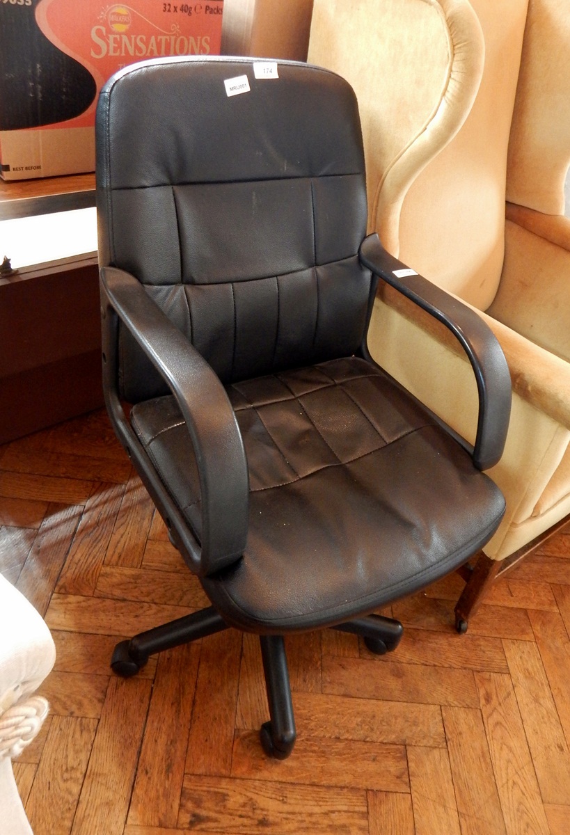A black leatherette office chair
