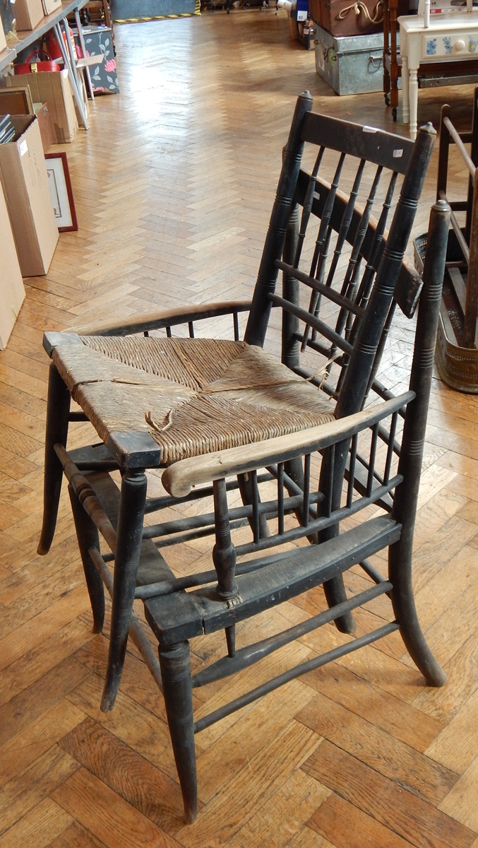 Pair stained Sussex style railback open armchairs on ring turned supports and similar rush seated