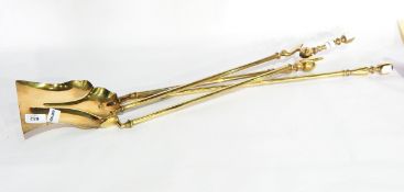 A set of three 19th century brass fireside tools including pair tongs,