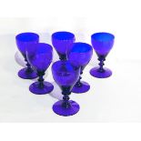 A set of six 19th c Bristol blue wine glasses with knop stems