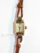 Lady's Rotary 9ct gold wristwatch in rectangular case with raised arch glass face