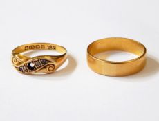 A 22ct gold wedding band and an 18ct gold, sapphire and diamond ring (one stone missing), approx. 5.