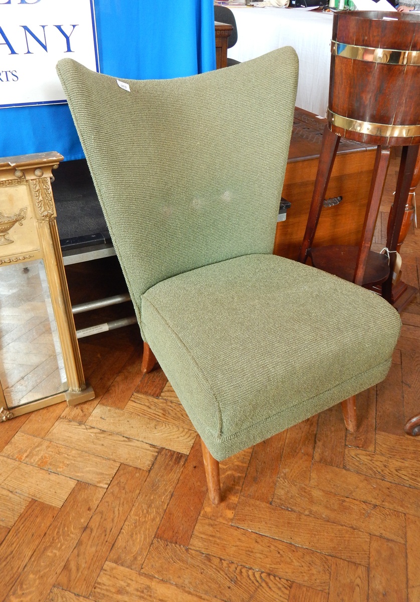 A pair of 1950's Howard Keith Encore chairs,