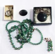 A pair of jade bead pendant earrings, two strings of jade-coloured beads,