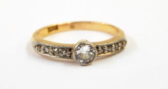 A gold and diamond solitaire ring,