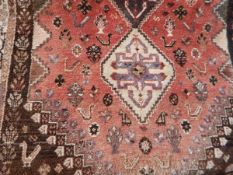 Eastern wool rug with red ground,