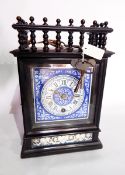 Victorian ebonised and ceramic mantel timepiece with turned gallery frieze,