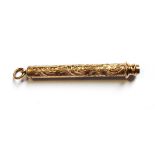 An Edwardian 9ct gold propelling pencil with foliate scroll decoration