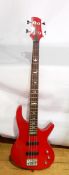 A Lindo red lacquered electric guitar with mother-of-pearl inlay to the neck,