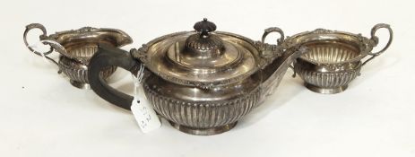 A silver three-piece bachelor's teaset by William Hutton & Sons Limited,