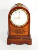 Late Victorian/Edwardian inlaid mahogany mantel timepiece with brass loop handle to the arched top,
