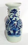 A Chinese porcelain vase with exotic bird, pine tree and peonies, in underglaze blue,