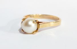 A 14K gold and pearl dress ring having claw set cultured pearl
