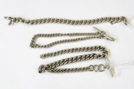 Three silver curb link albert chains