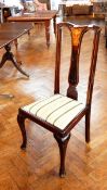 A set of four Edwardian inlaid dining chairs on cabriole legs