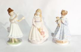 Three Royal Worcester china figures of children "I Dream" and "I Wish" and "I Hope"