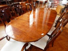 A mahogany D-end extending dining table with extra leaf, on splayed feet,