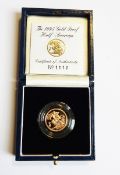 A 1995 gold proof half-sovereign,