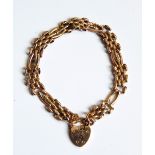 A gold gate-link bracelet marked 9ct, approx. 11.